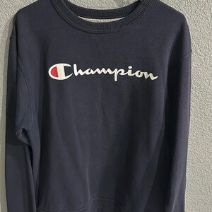 Medium navy blue champion sweat shirt.